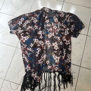 Floral shear bathing suit cover up.